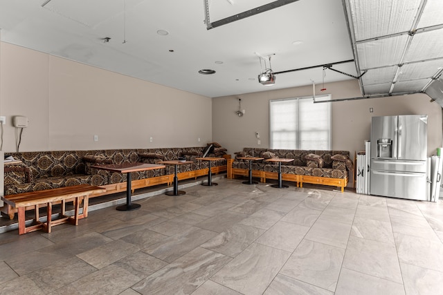 interior space featuring stainless steel fridge