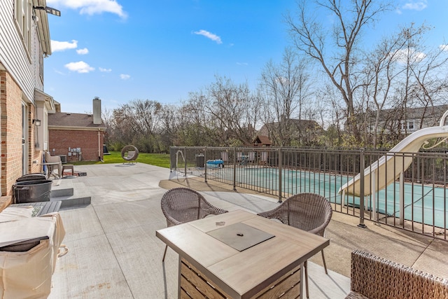 view of patio / terrace featuring a covered pool