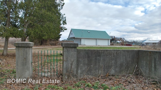 view of yard with a garage