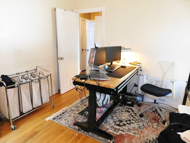 office area with light wood-type flooring