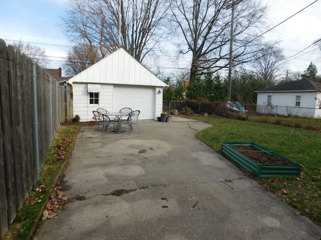 garage with a lawn