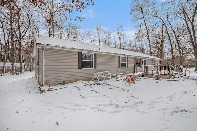 view of front of property featuring a deck