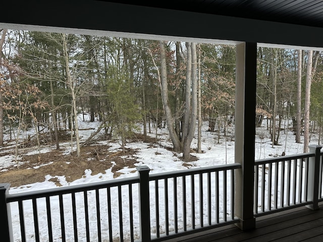 view of snow covered deck