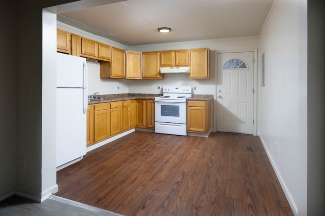 kitchen with sink, dark wood-type flooring, white appliances, and ornamental molding