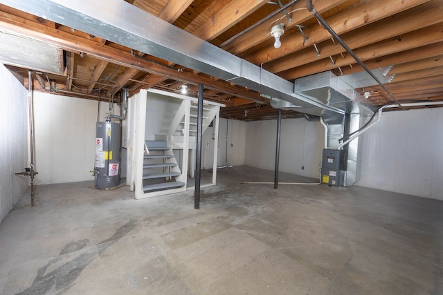 basement featuring heating unit and gas water heater