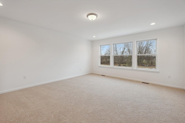 view of carpeted spare room