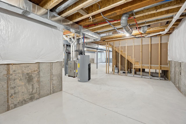 basement featuring heating unit and gas water heater