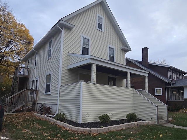 view of property exterior with a balcony