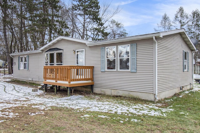 view of front of property with a deck