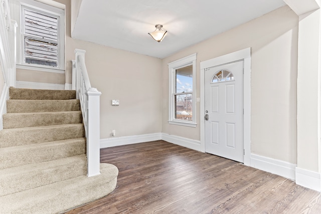 foyer entrance featuring hardwood / wood-style flooring