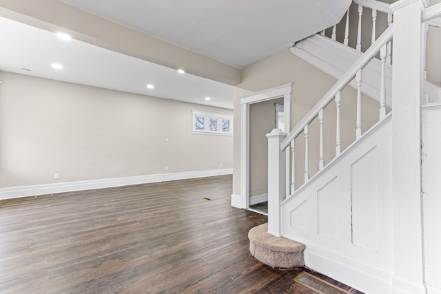 basement with dark wood-type flooring