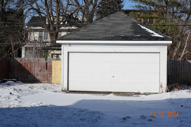 view of snow covered garage