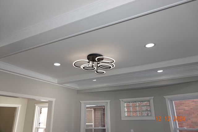 details featuring crown molding and beamed ceiling