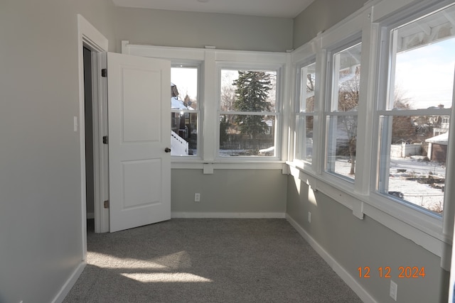 view of unfurnished sunroom