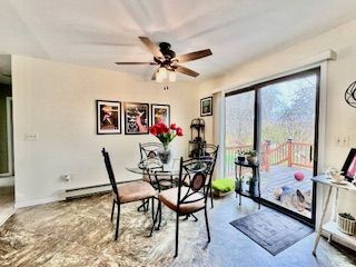 dining area with ceiling fan