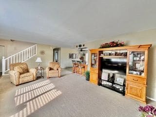 living room featuring carpet floors