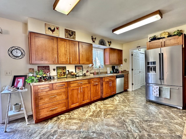 kitchen featuring appliances with stainless steel finishes and sink