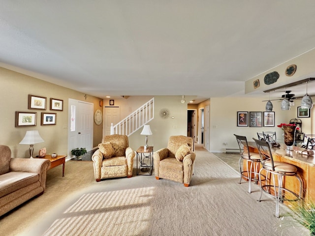 carpeted living room featuring ceiling fan