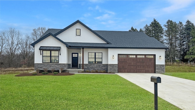 12711 Ivy Ln, Linden, MI 48451 - modern farmhouse style home with stone siding, an attached garage, a front yard, and roof with shingles