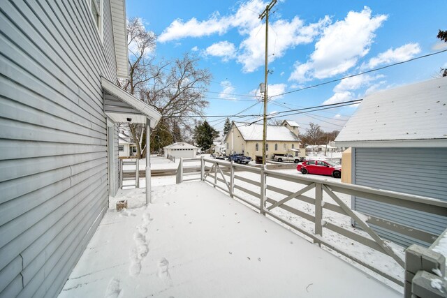 view of yard layered in snow