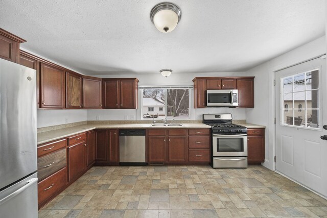 kitchen with sink and stainless steel appliances