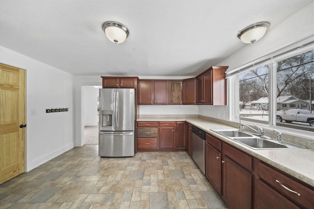 kitchen featuring appliances with stainless steel finishes and sink