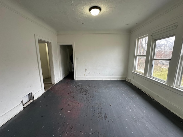 unfurnished room with dark wood-type flooring