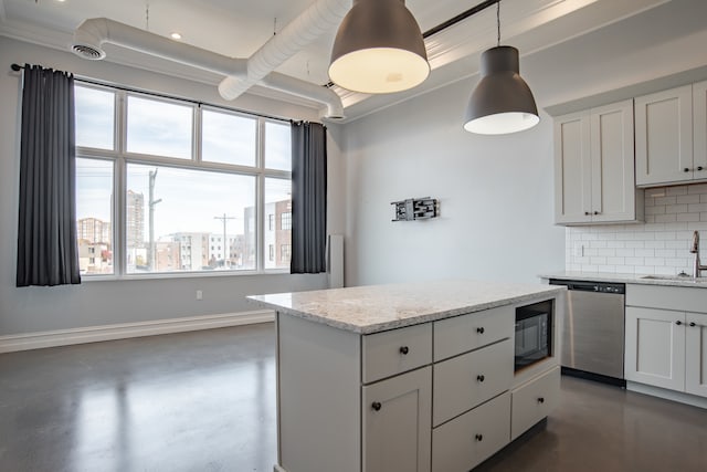 kitchen featuring backsplash, white cabinetry, stainless steel dishwasher, and light stone counters