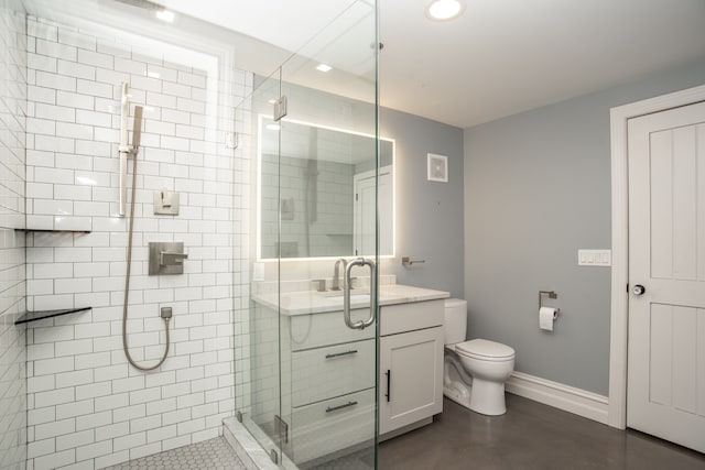 bathroom featuring toilet, a shower with door, and concrete flooring