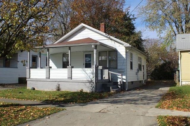 bungalow-style home featuring a porch