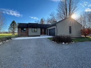 view of front of house featuring a garage and driveway