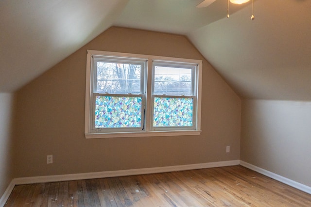 bonus room featuring ceiling fan, lofted ceiling, and light hardwood / wood-style floors