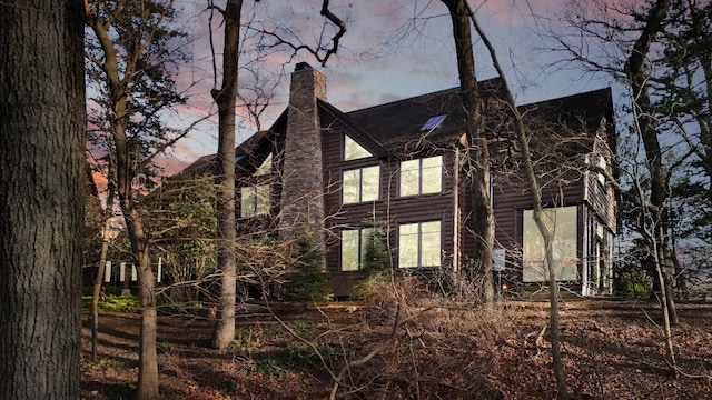 view of property exterior at dusk