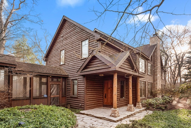 view of log-style house