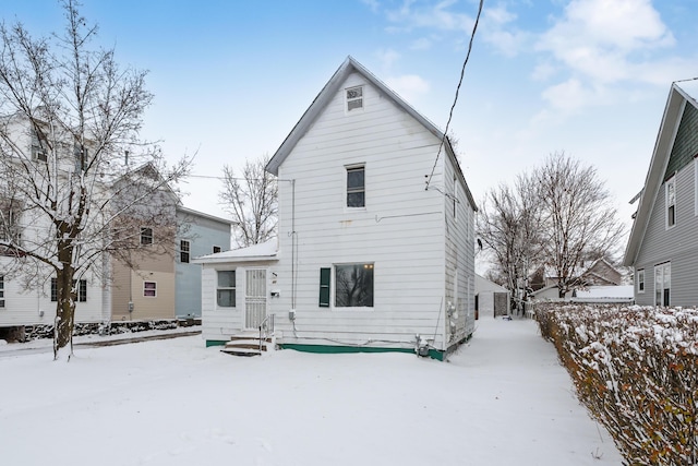 view of snow covered house