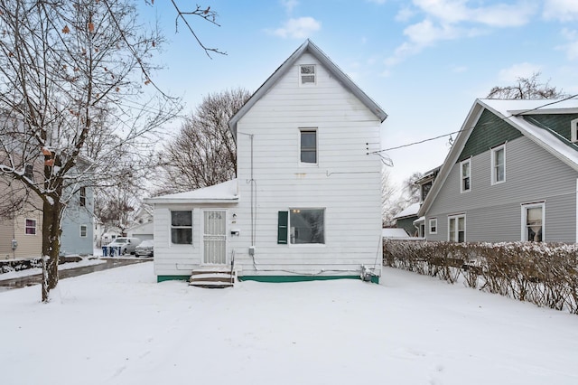 view of snow covered property