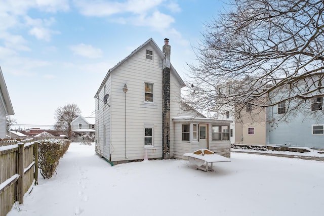 view of snow covered property