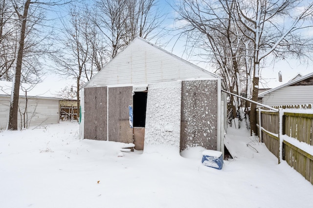 view of snow covered garage