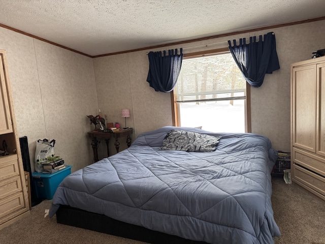 bedroom featuring crown molding, carpet floors, and a textured ceiling