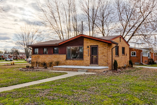 view of front of home with a front yard