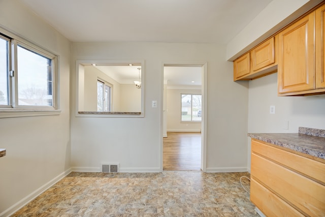 kitchen with light brown cabinets