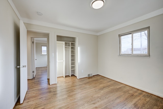 unfurnished bedroom featuring light hardwood / wood-style flooring