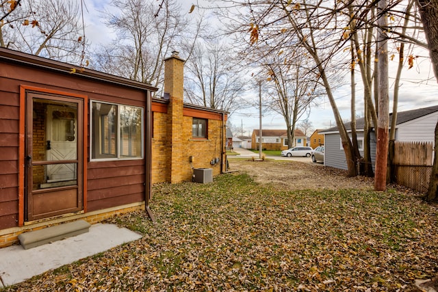 view of yard with central AC unit