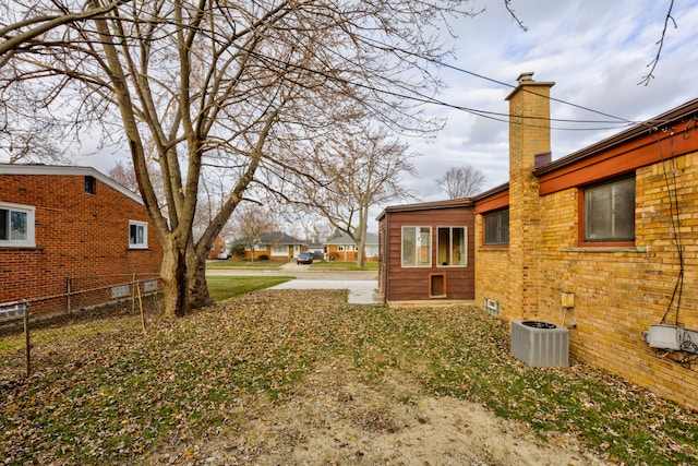 view of yard with central AC unit