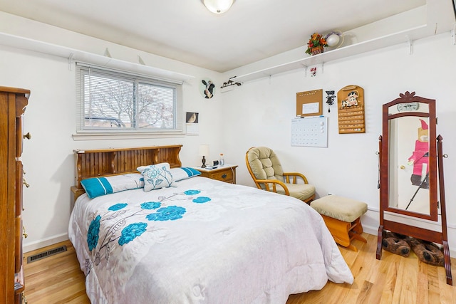 bedroom featuring light hardwood / wood-style flooring