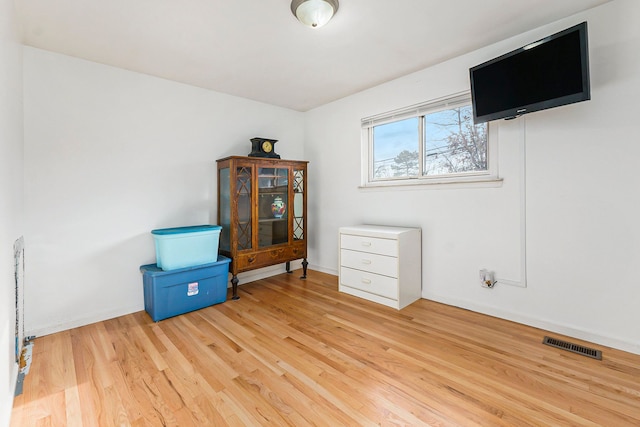 misc room with light hardwood / wood-style flooring