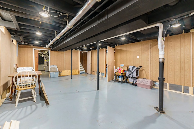 basement with wooden walls