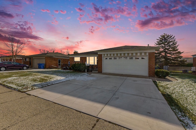 single story home with a garage