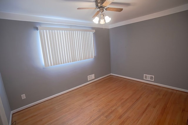 spare room with ceiling fan and light hardwood / wood-style flooring