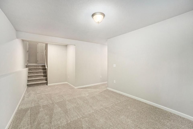 basement with light carpet